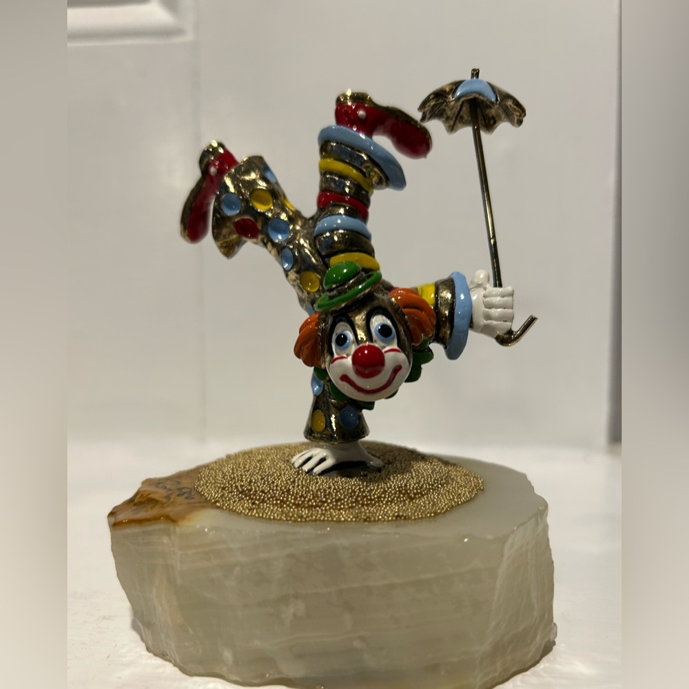 Beautiful Ron Lee hand painted collectible hand stand clown.